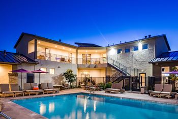 Pool overlook balcony with exclusive seating and fireplace